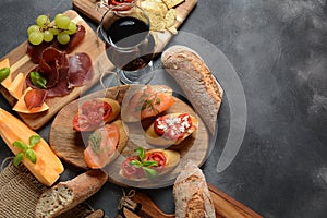 Brushetta or traditional Spanish tapas. Appetizers with Italian antipasti snacks.