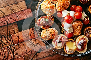 Brushetta or traditional spanish tapas. Appetizers italian antipasti snacks set with wine. Top view and flat lay with