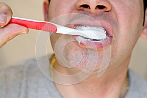 Brushing His Teeth