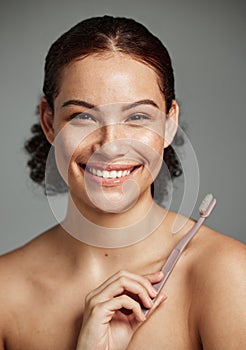 Brushing teeth, toothbrush and a woman portrait while happy about dental hygiene and teeth whitening. Face of a female