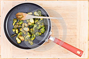 Brussel sprouts cooked in non-stick pan photo