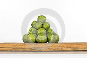Brussel sprouts on a wooden board