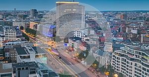 Brussels / Belgium - 2020: View from above during the blue hour in the evening over the north part of the city with traffic lights