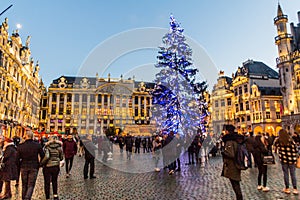 BRUSSELS, BELGIUM - DECEMBER 17, 2018: Evening view of the Grand Place (Grote Markt) with a christmas tree in Brussels