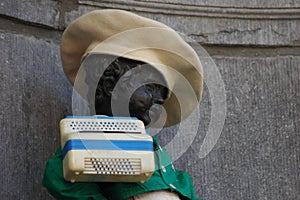 Brussels, Belgium - dressed Manneken Pis seen close to the Grand Place