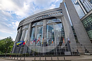 BRUSSELS, BELGIUM, June 23, 2023, Waving flags in front of the European Parliament building in Brussels.