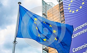 European Union flag in front of the Berlaymont building, headquarters of European Commission