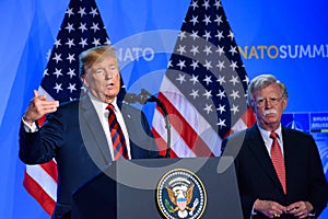 Donald Trump, President of United States of America and John R. Bolton, during press conference at NATO SUMMIT 2018.