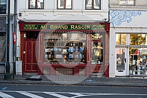 Brussels Old Town, Brussels Capital Region, Belgium - Facade of a traditional knife and rasor shop with French inscription