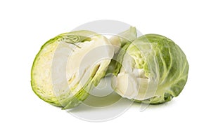 Brussels sprouts on a white background. Fresh small Brussels sprouts, cut in half, Brussels sprouts texture