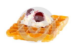 Brussels waffle with cream and cherries brightened