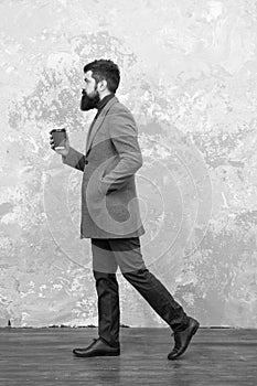 Brutal bearded hipster in denim wear. trendy man with beard. Modern life. Male fashion model. Mature businessman drink