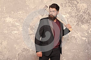 Brutal bearded man with axe. Collection agency or debt collector. Businessman with ax. Threat to debtors. Debt