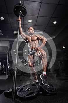 Brutal bodybuilder athletic man with perfect body photo