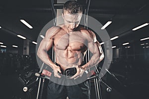 Brutal bodybuilder powerful training arms, pectorals and shoulde