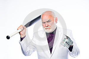 Brutal business life. Racket and raiding. Kingpin concept. Black cash money. Senior man hold cash money and baseball bat photo