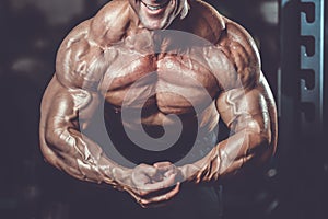 Brutal caucasian handsome fitness men on diet training chest pum