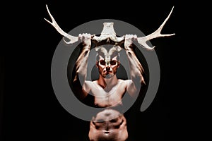 Brutal man with horns