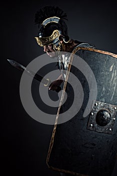 Brutal warrior with sword and shield photo