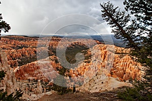 Bryce Canyon National Park - snow storm at sunset, United States of America