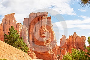 Bryce Canyon - Peek a boo hiking trail with scenic view of massive steep hoodoo sandstone rock formation towers in Utah, USA