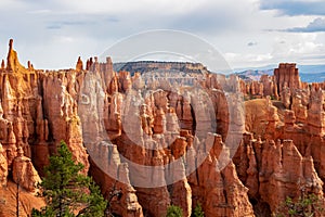 Bryce Canyon - Queens Garden hiking trail with scenic view of massive steep hoodoo sandstone rock formation towers in Utah, USA