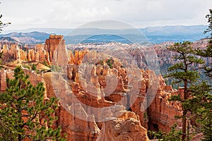 Bryce Canyon - Queens Garden hiking trail with scenic view of massive steep hoodoo sandstone rock formation towers in Utah, USA