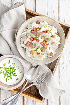 Bryndzove Halusky, national dish in Slovakia, potato dumplings with sheep cheese and sour cream, topped with roasted bacon pieces