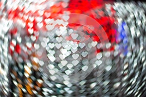 Ðbstract sweet colorful heart shaped bokeh. Street light blurred background. Valentine`s day and love concept