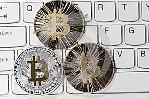BTC Bitcoin coins on keyboard
