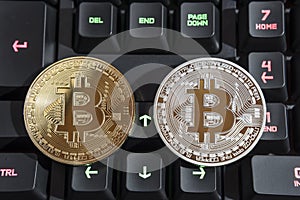 BTC Bitcoin coins on keyboard