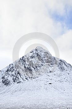 Buachaille Etive Mor covered in snow during winter aerial view