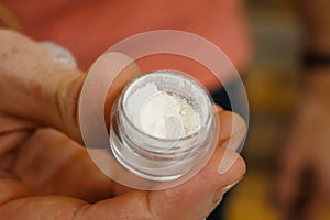 Bubble with white powder, heroin in glass flask