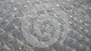 Bubble wrap close-up. Bubble wrap is a pliable transparent plastic material used for packing fragile items.