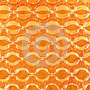 Bubble wrap in front of orange paper.