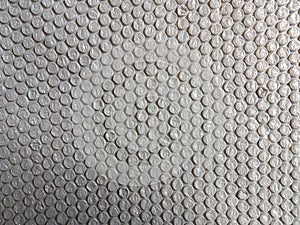 Bubble wrap texture plastic material background grey secure packing surface