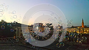 Bubbles on the air in front of the evening of historical city florence