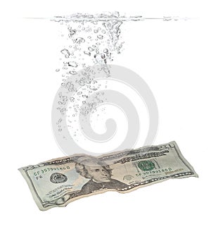 Bubbles and Dollar banknote in water