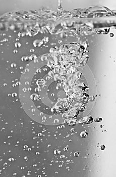 Bubbles in a glass of water