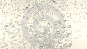 Bubbles in mineral water, slow motion