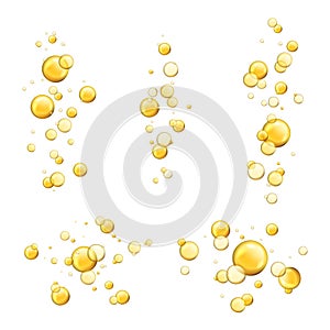 Bubbles oil. Shiny realistic drops, cosmetic gold pill capsule collagen serum. Oily vitamin essence droplets. Flying yellow liquid