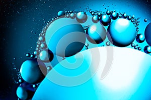 Bubbles of oxygen in water. Water structure. Blue abstract water bubbles texture background