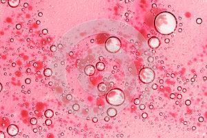 Bubbles on pink jelly