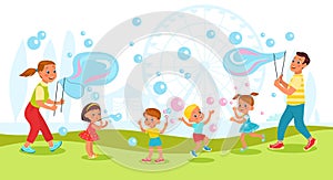 Bubbles show. Adults make big soap balls in park for kids. Happy children play with flying soapy balloons. Outdoor