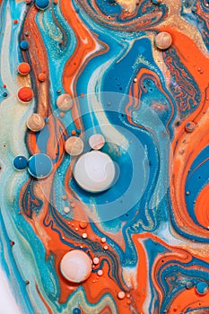 Bubbles and spheres of blue gold orange and white in dizzying cascade of colors in abstract background asset painting