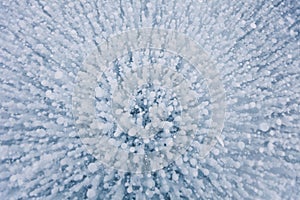 Bubbles texture in ice of Baikal lake. Winter background