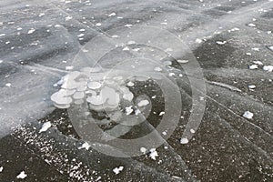 Bubbles under ice, formation of ice on the river