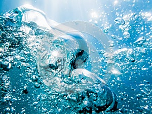 Bubbles underwater in sea. Water texture in ocean