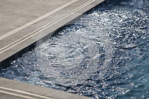 Bubbles from working drain in swimming pool