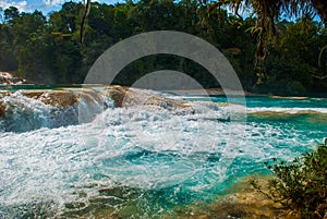 Bubbling turquoise water in the waterfall Agua Azul, Chiapas, Palenque, Mexico